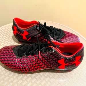 Red and black soccer cleats